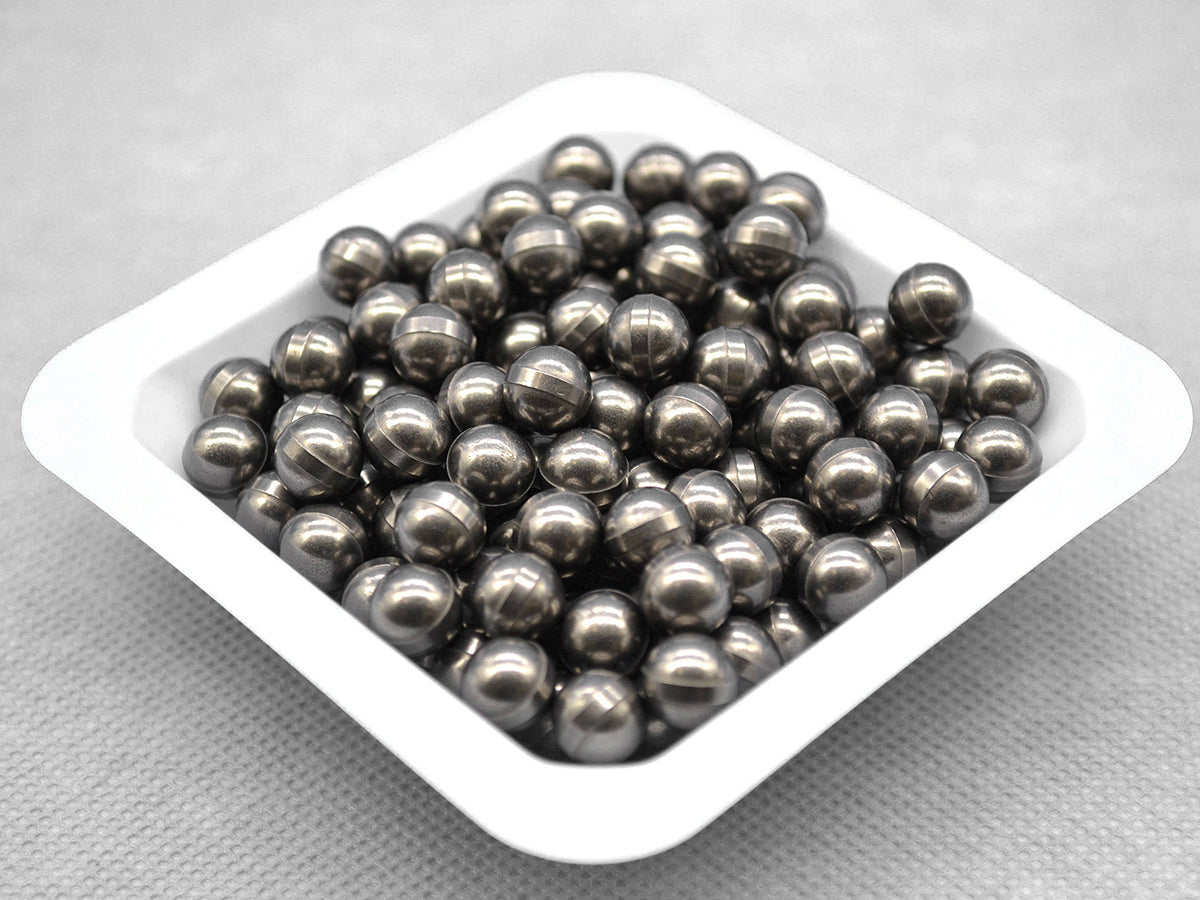 Tungsten carbide (WC-Co) milling balls (3–20 mm, 1 kg) with high density and wear resistance for planetary ball milling and hard material grinding.