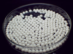 SZS zirconium silicate milling beads (0.4–14 mm) provide durable, smooth media for large-volume bead mills in pigments and chemical processing.