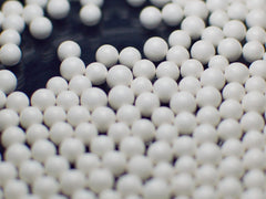 SZS zirconium silicate milling beads (0.4–14 mm) provide durable, smooth media for large-volume bead mills in pigments and chemical processing.
