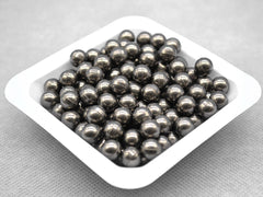 Tungsten carbide (WC-Co) milling balls (3–20 mm, 1 kg) with high density and wear resistance for planetary ball milling and hard material grinding.